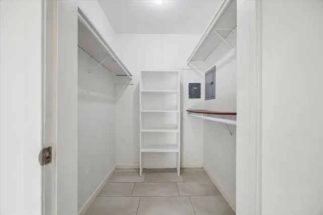 a view of an empty walk in closet