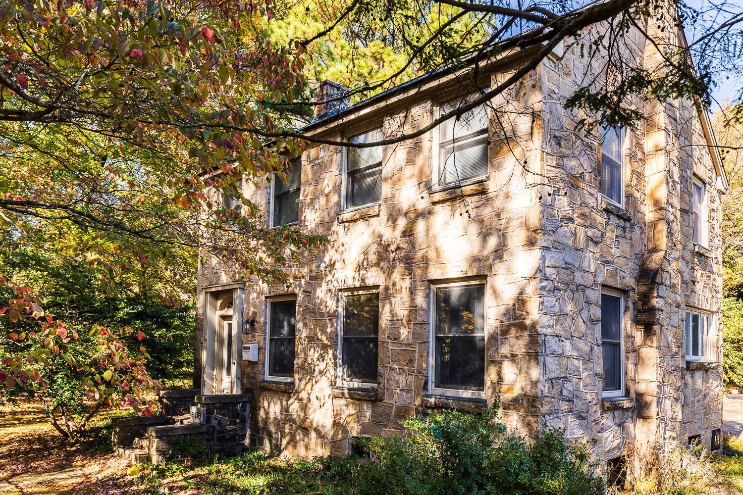 a view of a building with a tree