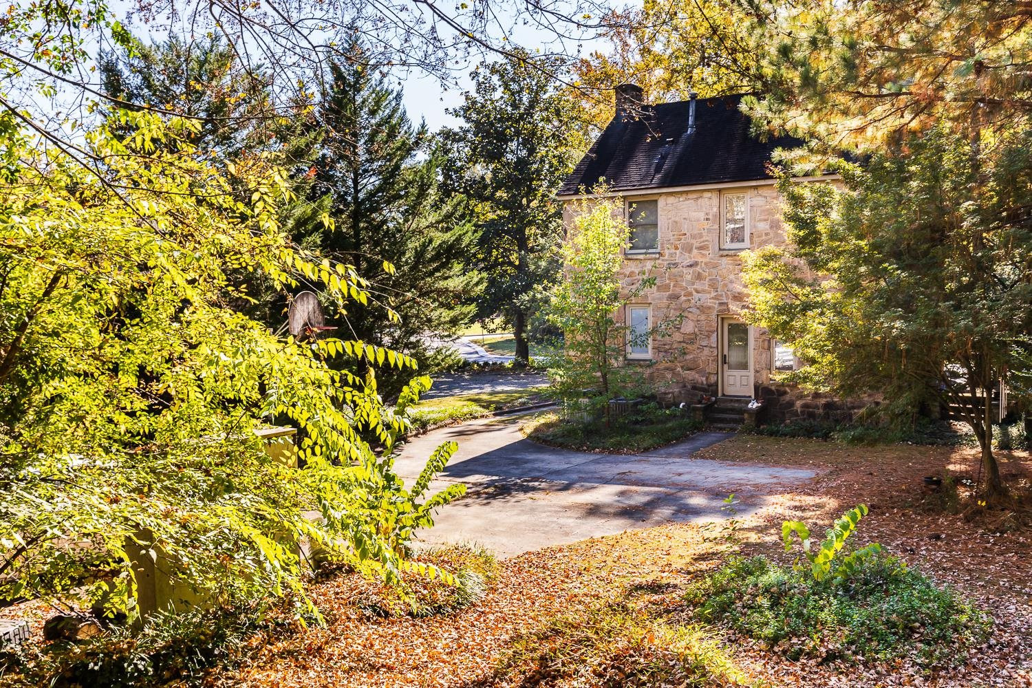 808 Williamson Drive Raleigh, NC 27608 - Photo 11 of 32 a view of a house with a tree