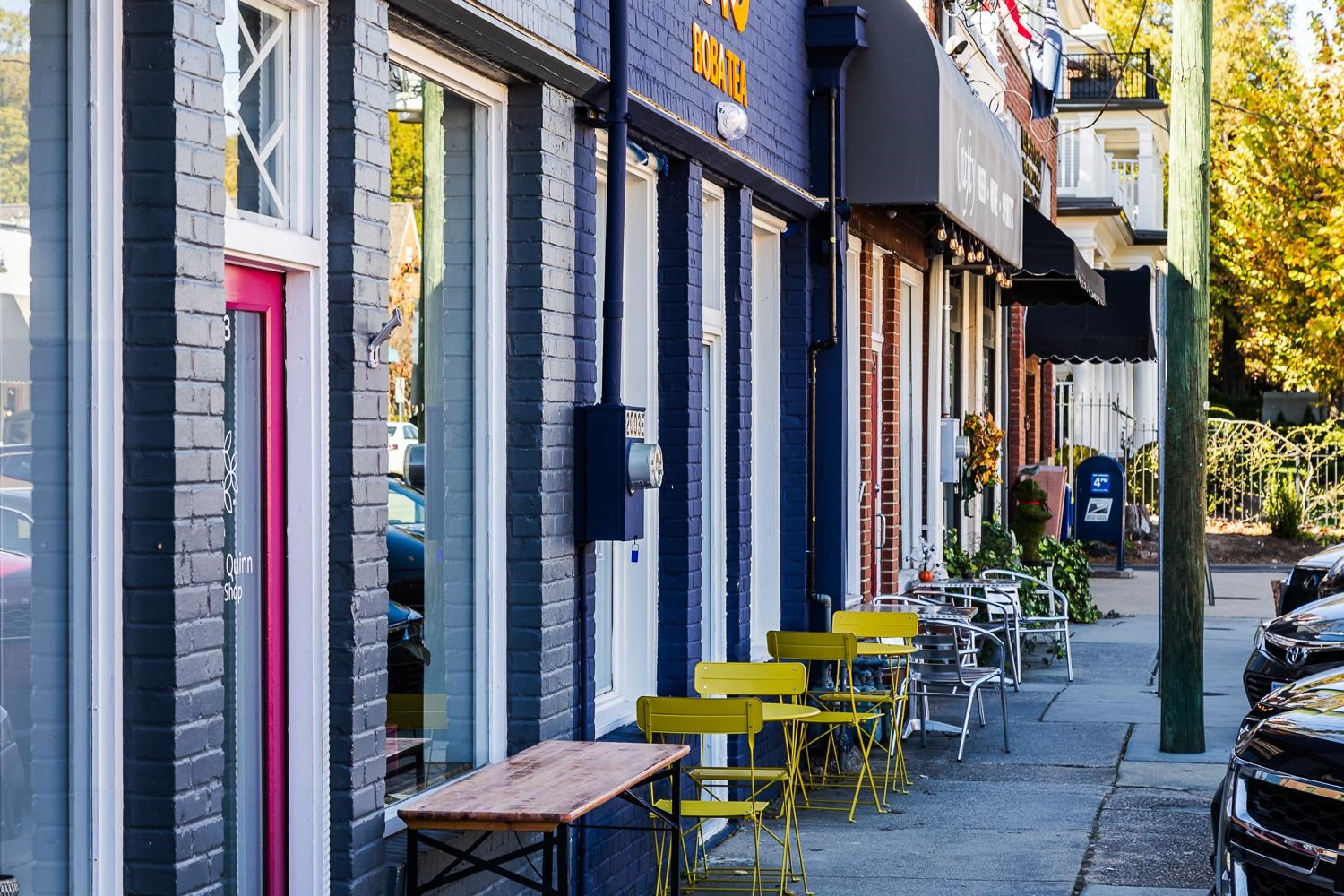 808 Williamson Drive Raleigh, NC 27608 - Photo 27 of 32 a view of outdoor area with chairs and umbrellas