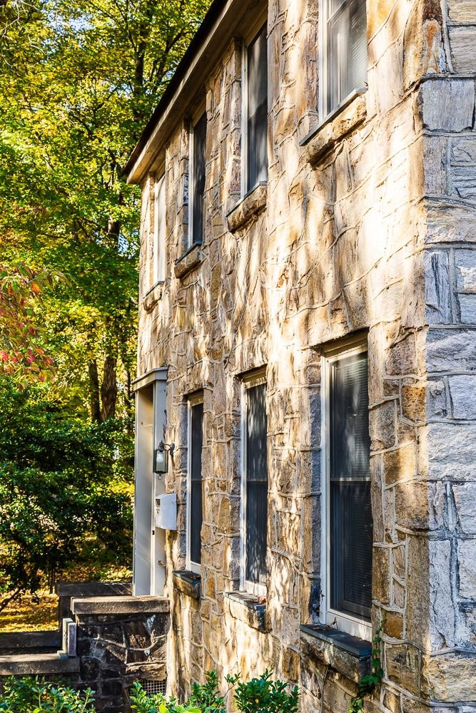 808 Williamson Drive Raleigh, NC 27608 - Photo 5 of 32 a city street lined with tall buildings