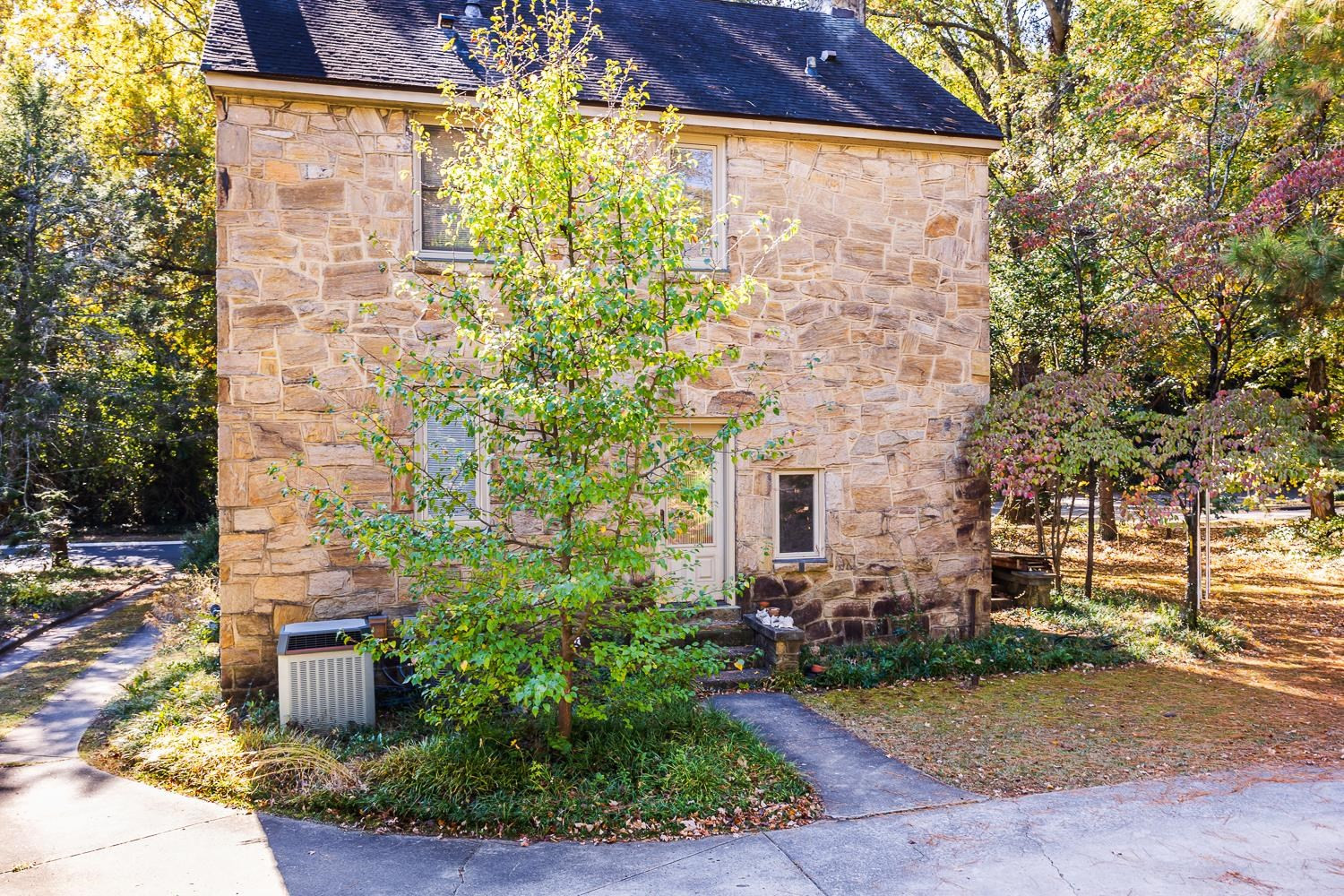 808 Williamson Drive Raleigh, NC 27608 - Photo 10 of 32 a front view of a house with garden