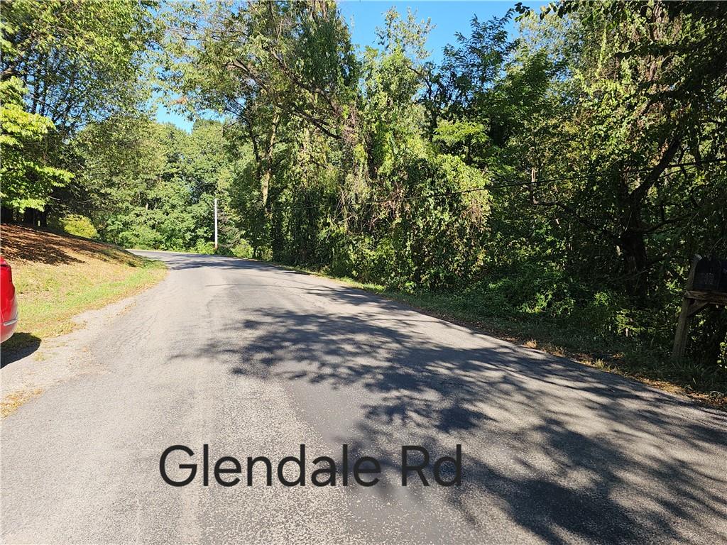 0 Glendale Road Beaver Falls, PA 15010 - Photo 6 of 23 a view of a street with trees in the background