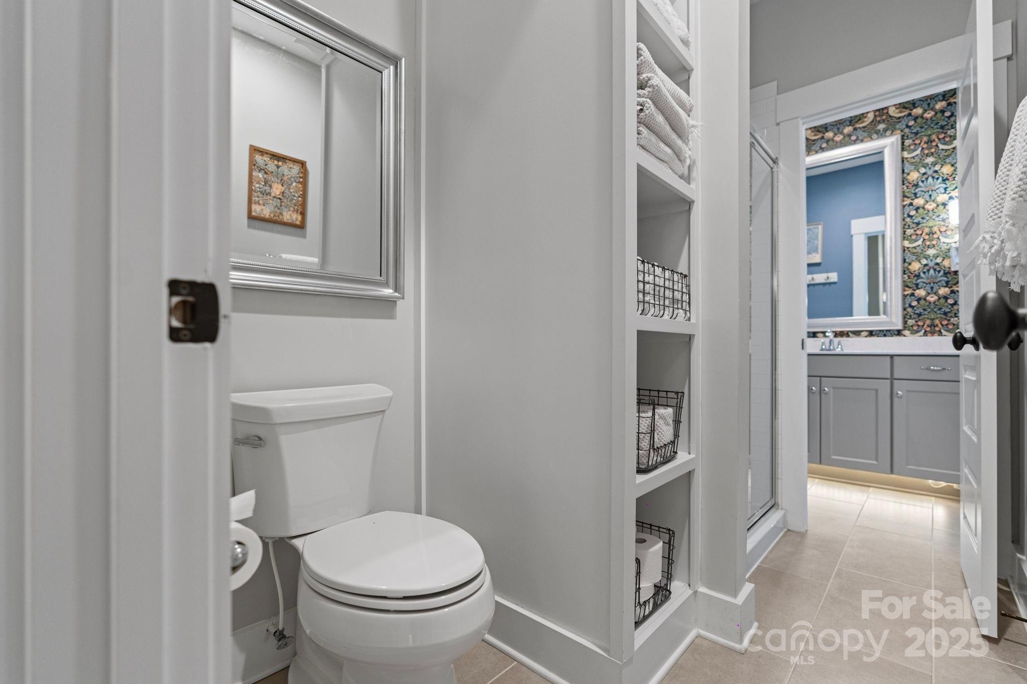 1502 Matthew McClure Circle Davidson, NC 28036 - Photo 38 of 48 a bathroom with a toilet and a sink