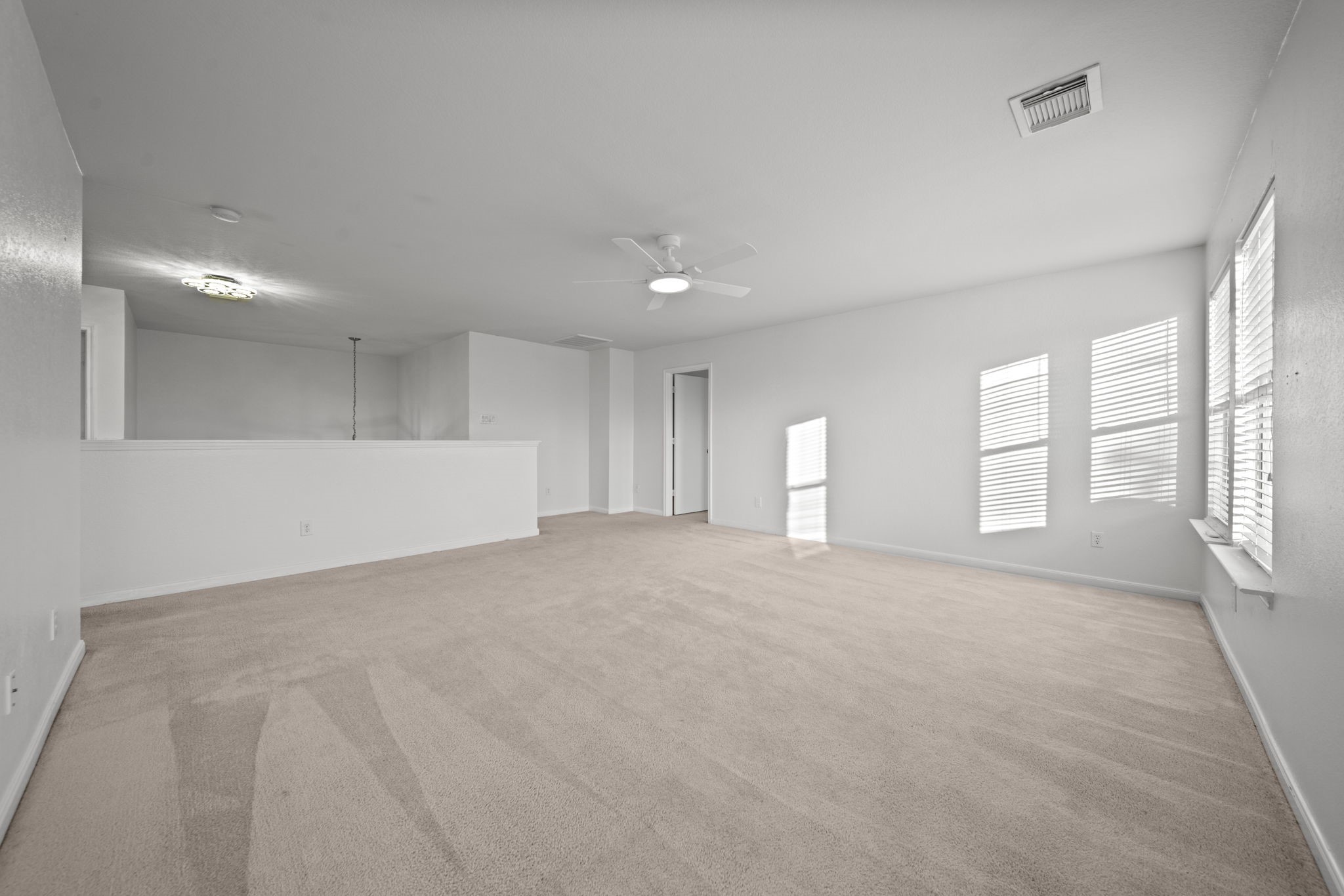 6323 Channelbrook Lane Spring, TX 77379 - Photo 15 of 24 a view of an empty room with a window