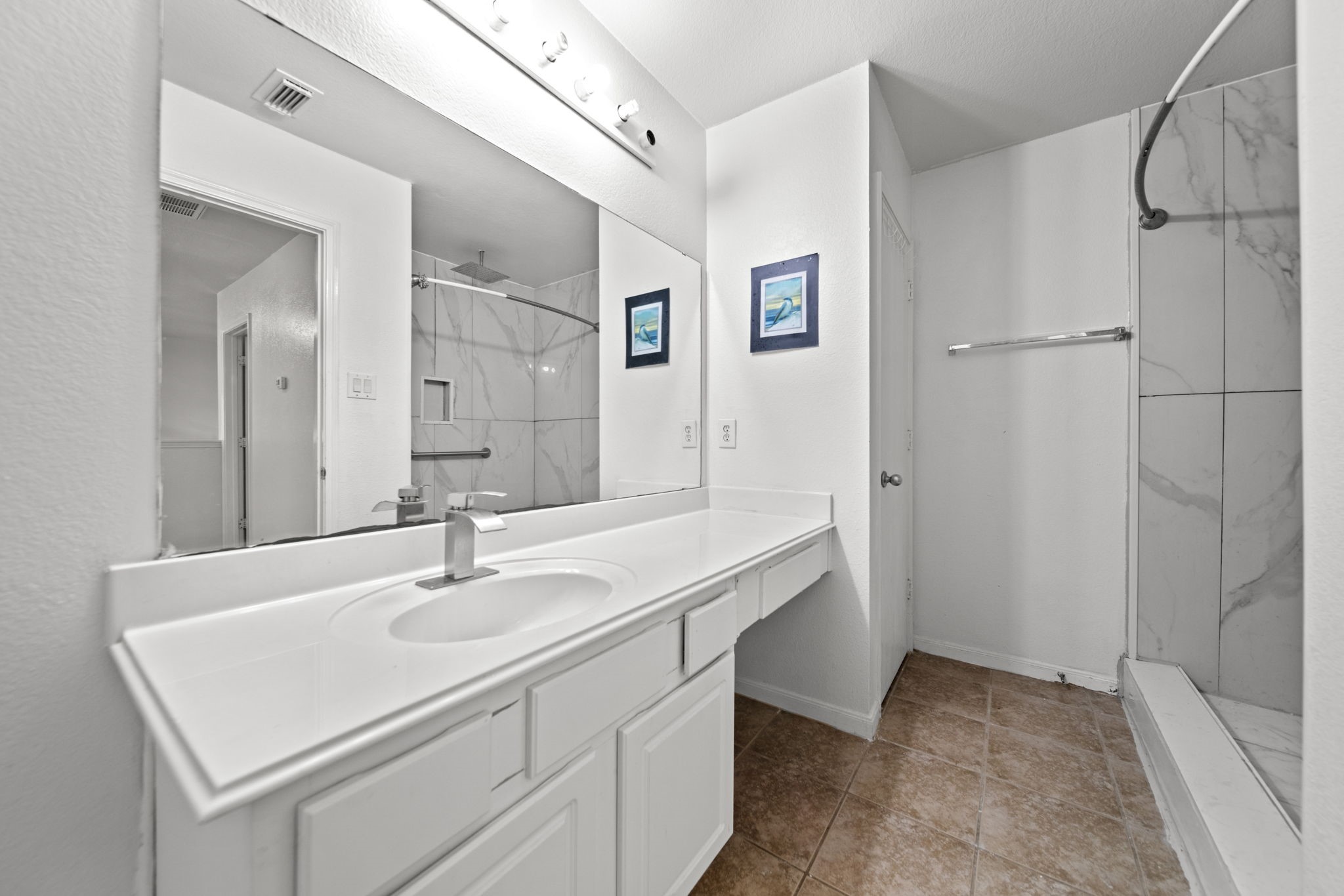 6323 Channelbrook Lane Spring, TX 77379 - Photo 21 of 24 a bathroom with a sink and a mirror