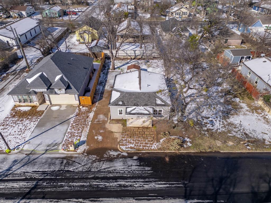 603 East Willingham Street Cleburne, TX 76031 - Photo 24 of 25 an aerial view of residential houses with outdoor space