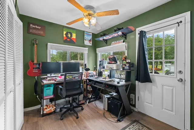 a work room with furniture and a window