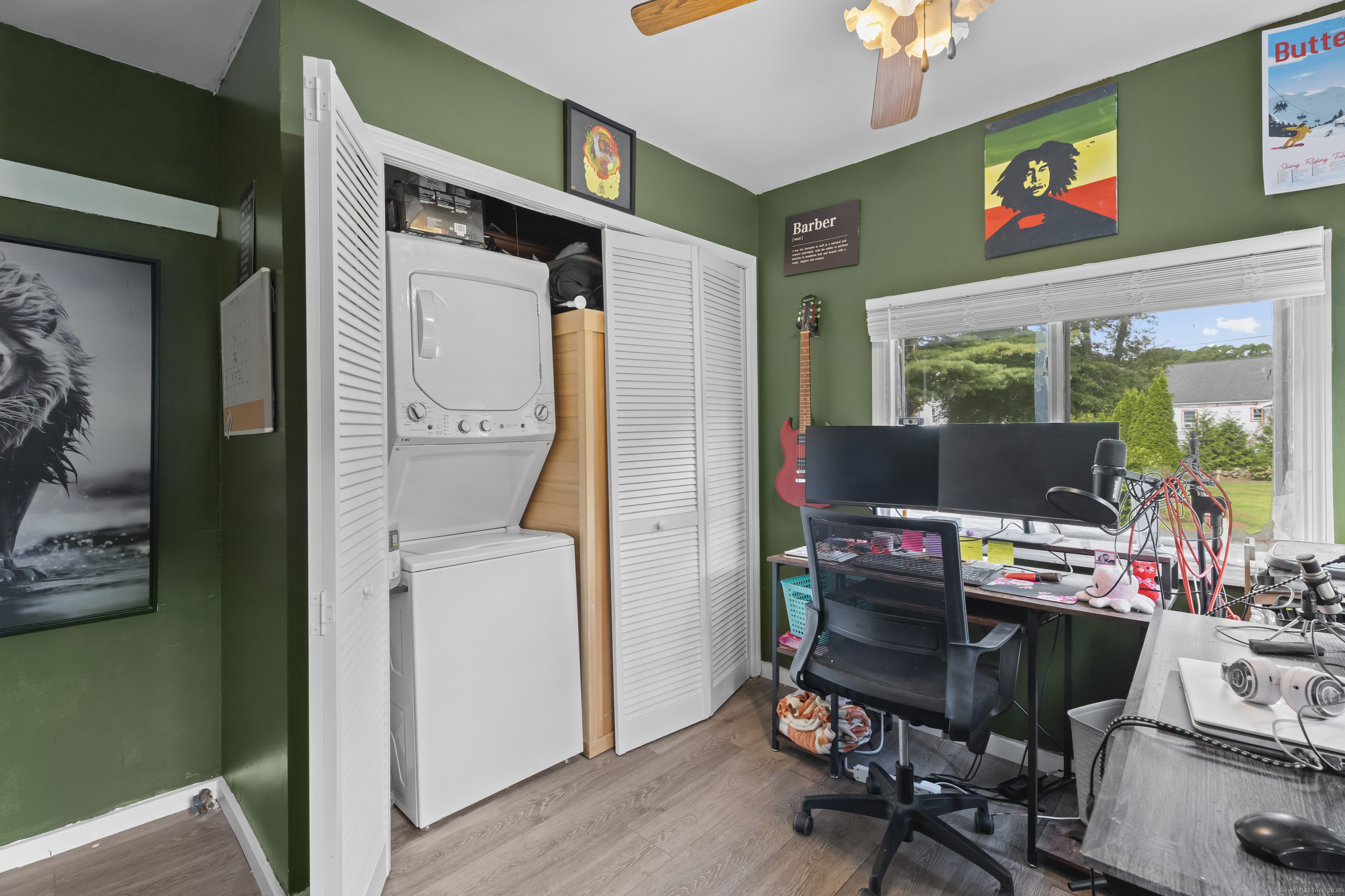 133 West Main Street, Unit MV1 Clinton, CT 06413 - Photo 15 of 36 a living room with furniture and a flat screen tv