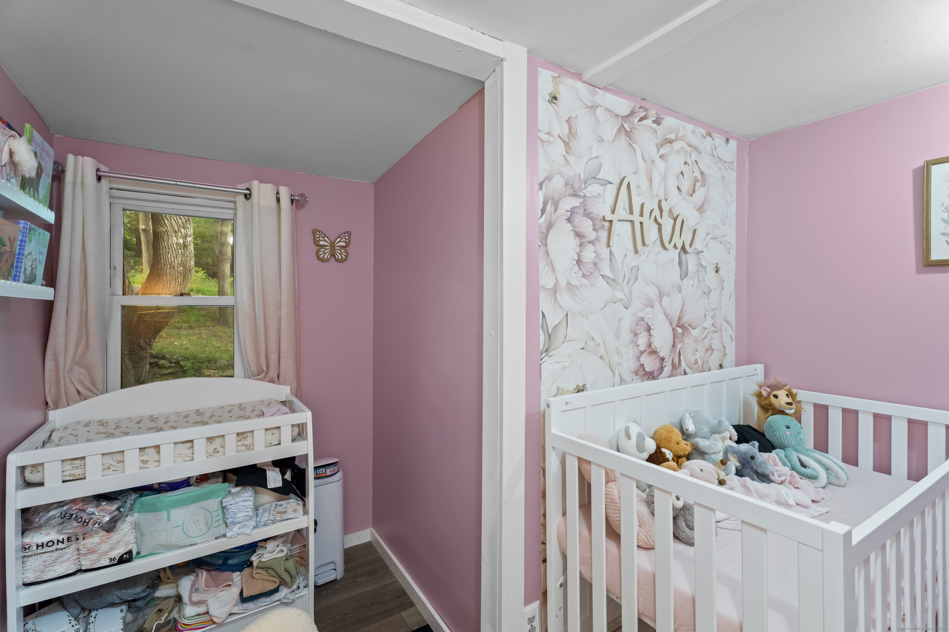 133 West Main Street, Unit MV1 Clinton, CT 06413 - Photo 20 of 36 a bedroom with a bed and a dresser in it