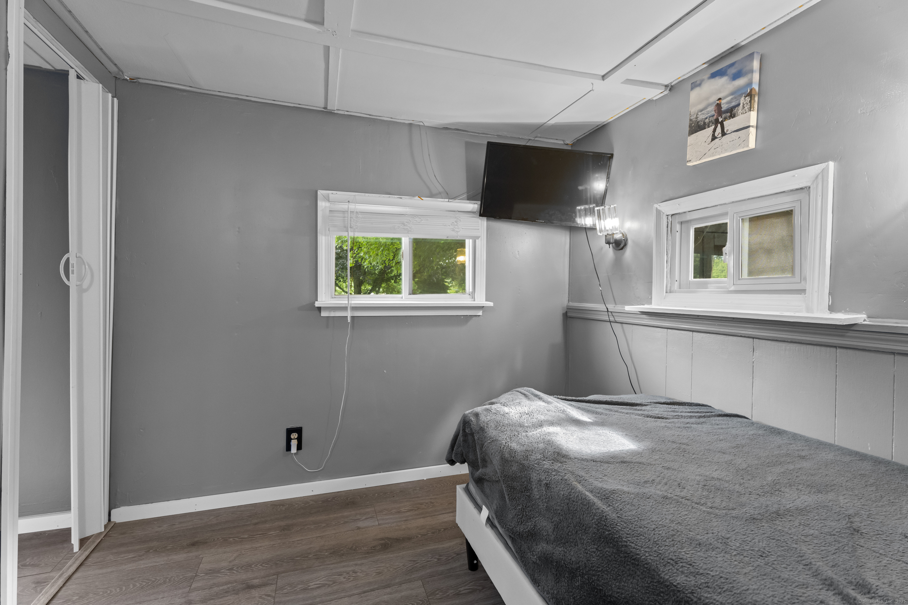 133 West Main Street, Unit MV1 Clinton, CT 06413 - Photo 25 of 36 a bedroom with a bed and a window