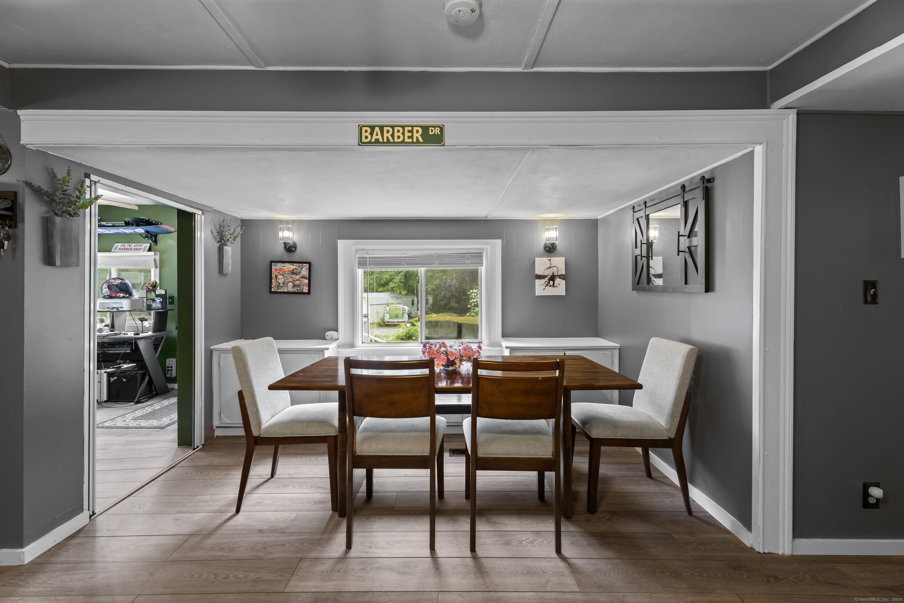 133 West Main Street, Unit MV1 Clinton, CT 06413 - Photo 5 of 36 a dining room with furniture and wooden floor