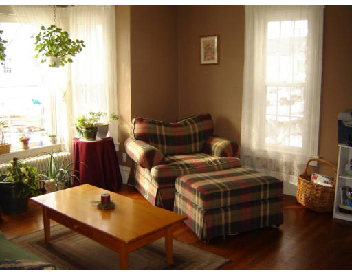 21 Prospect Street Ware, MA 01082 - Photo 9 of 12 a bedroom with two beds and a table