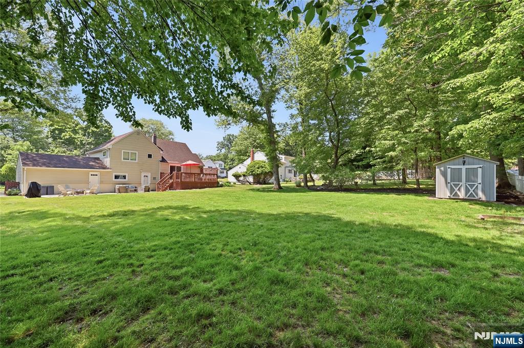 77 White Pond Road Waldwick, NJ 07463 - Photo 33 of 33 a front view of a house with garden