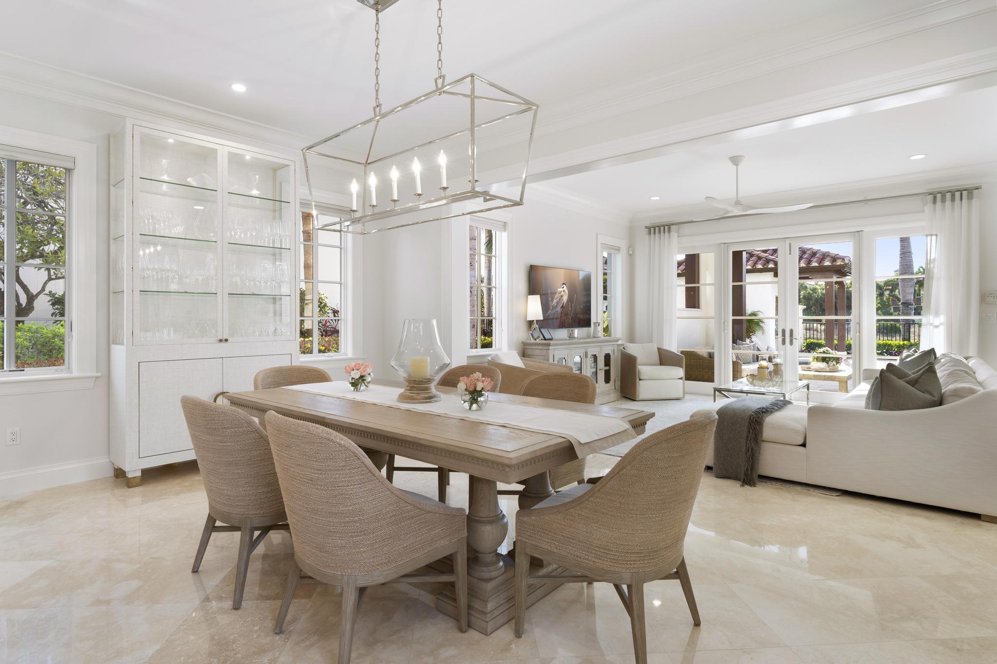 426 Red Hawk Drive Jupiter, FL 33477 - Photo 13 of 70 a view of a dining room with furniture window and outside view