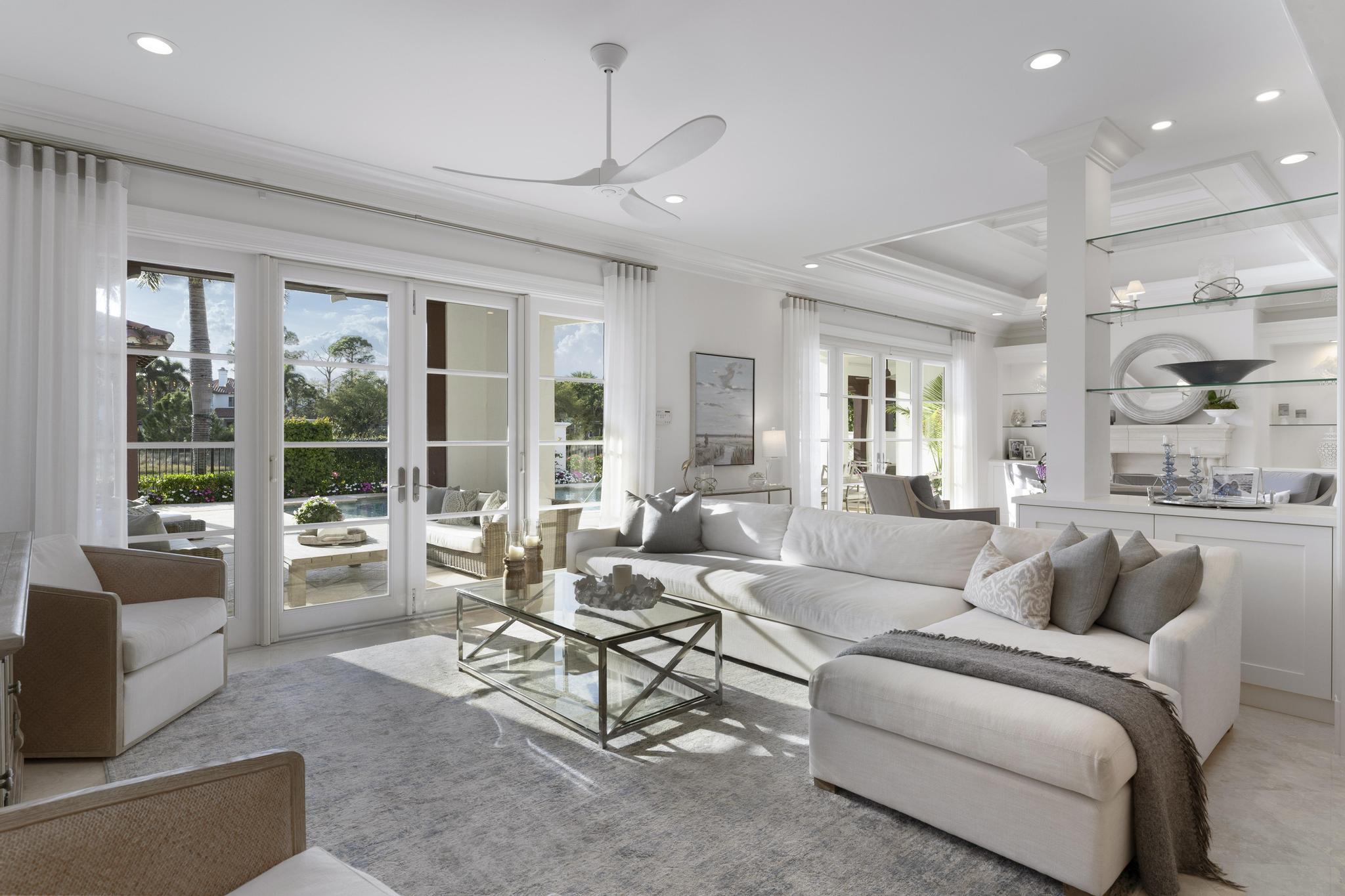 426 Red Hawk Drive Jupiter, FL 33477 - Photo 14 of 70 a living room with furniture and a large window