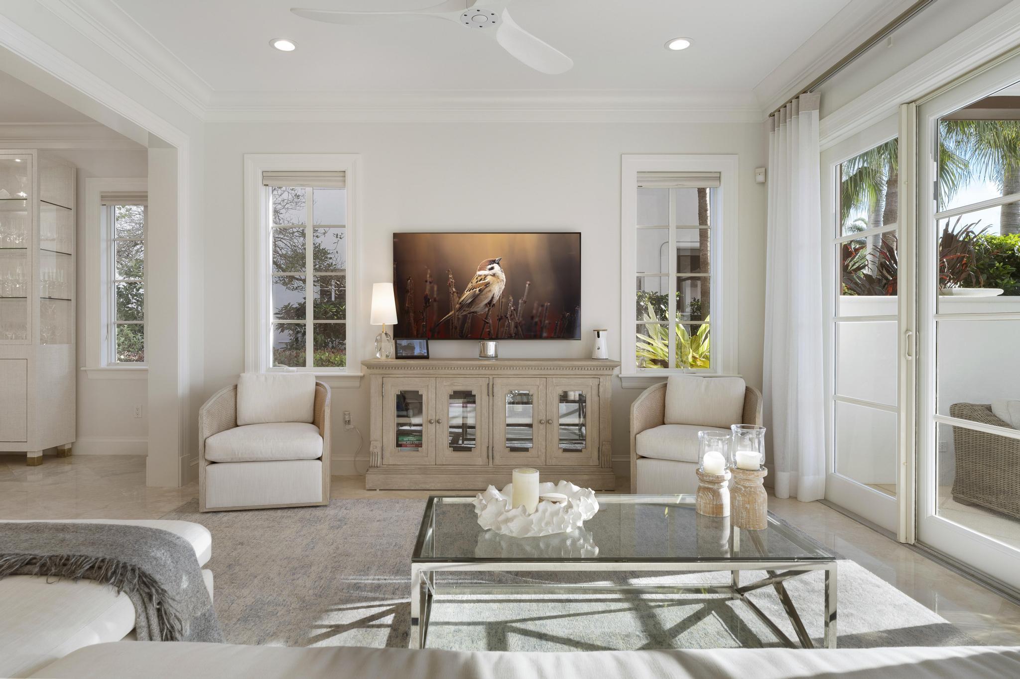 426 Red Hawk Drive Jupiter, FL 33477 - Photo 15 of 70 a living room with furniture and a flat screen tv