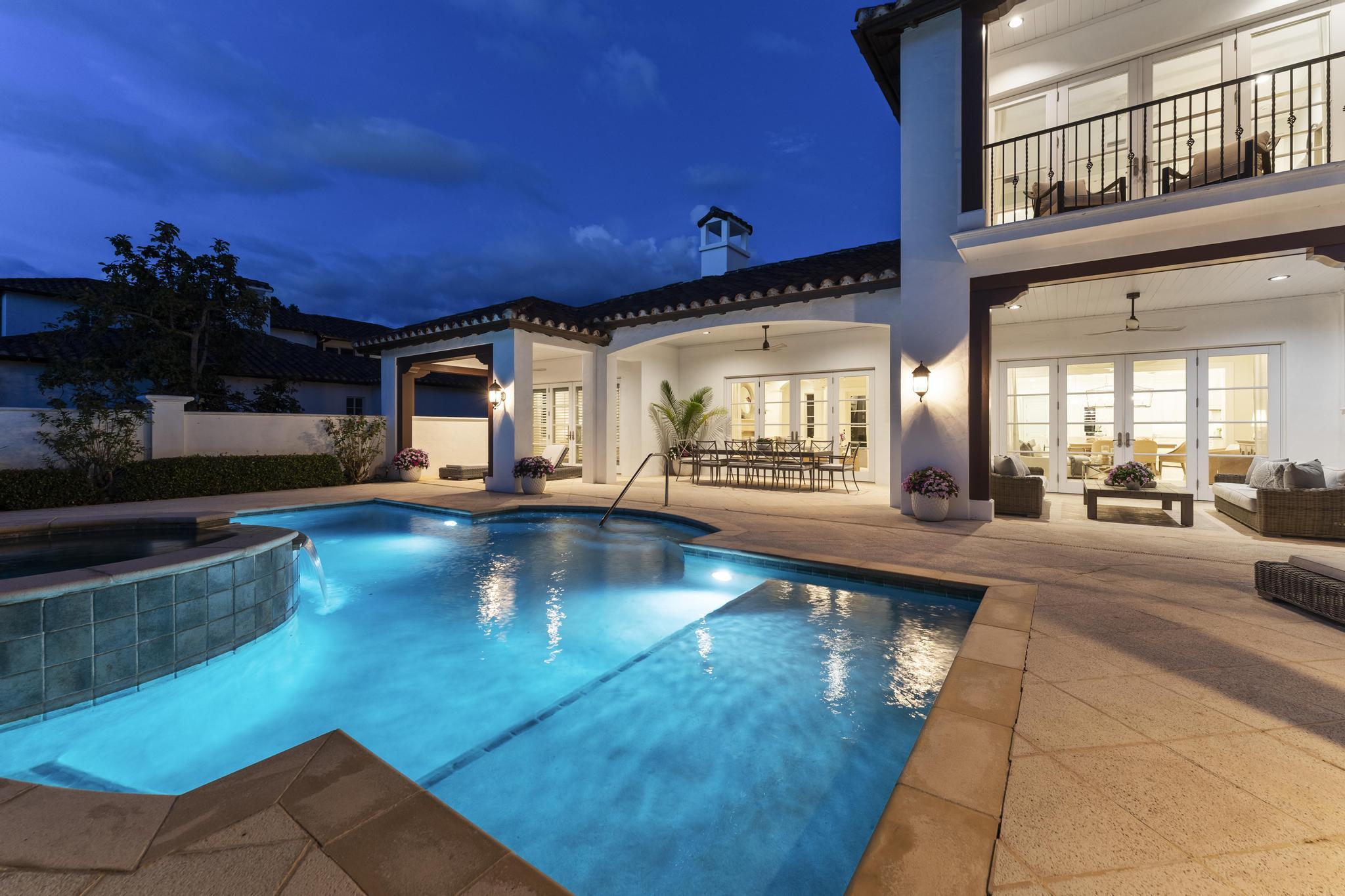 426 Red Hawk Drive Jupiter, FL 33477 - Photo 44 of 70 a view of a swimming pool with outdoor seating