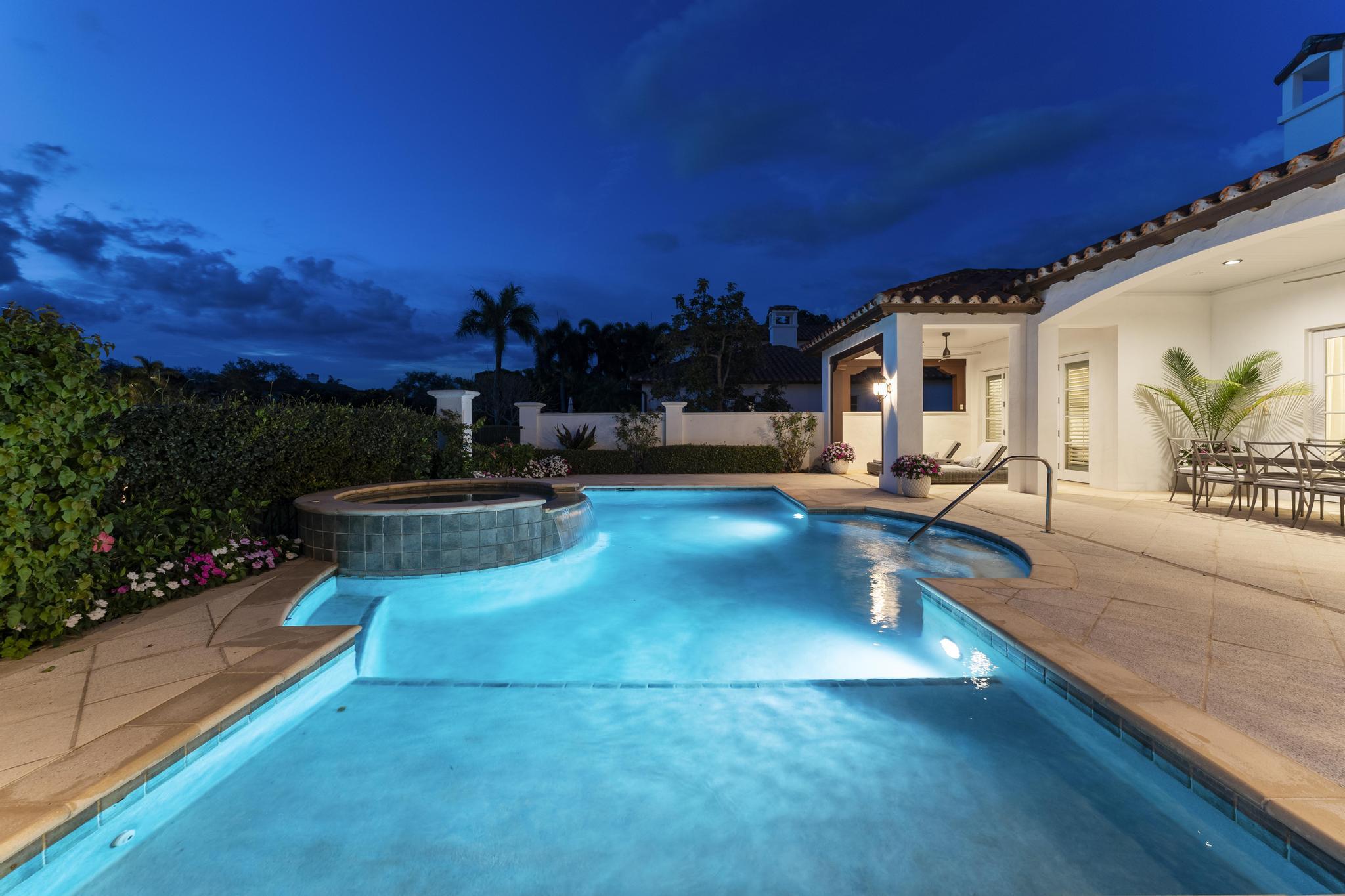 426 Red Hawk Drive Jupiter, FL 33477 - Photo 45 of 70 a view of a backyard with plants and a patio