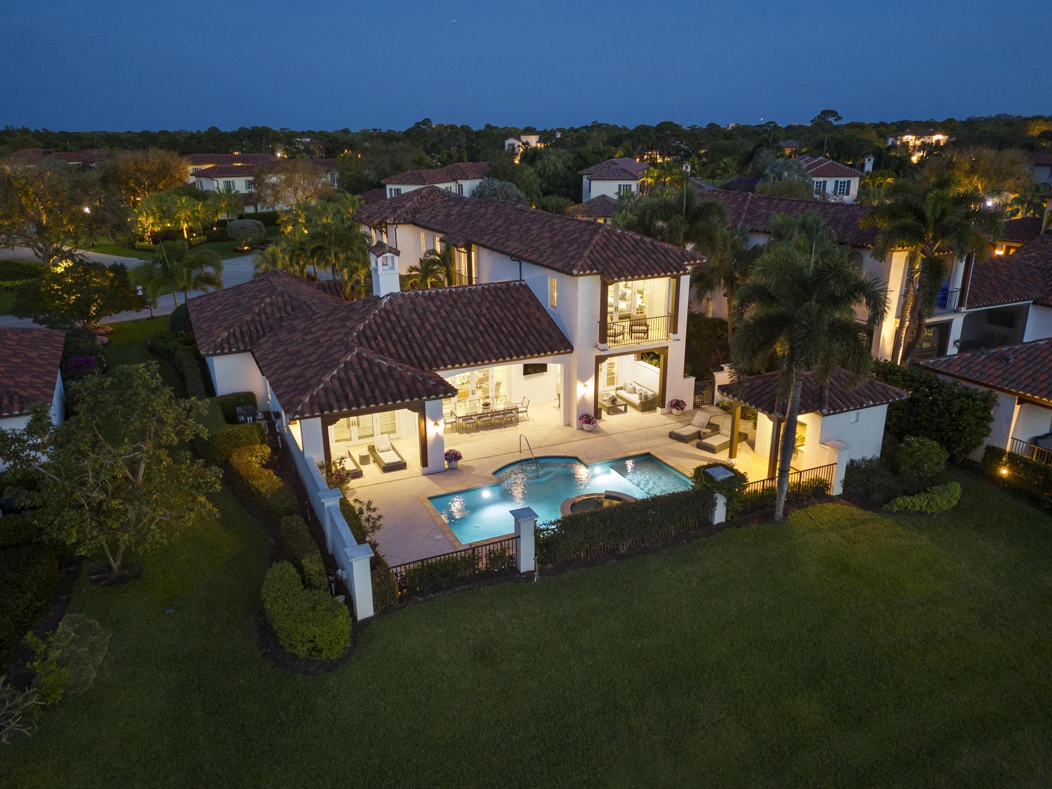 426 Red Hawk Drive Jupiter, FL 33477 - Photo 48 of 70 an outdoor sitting area with golf course