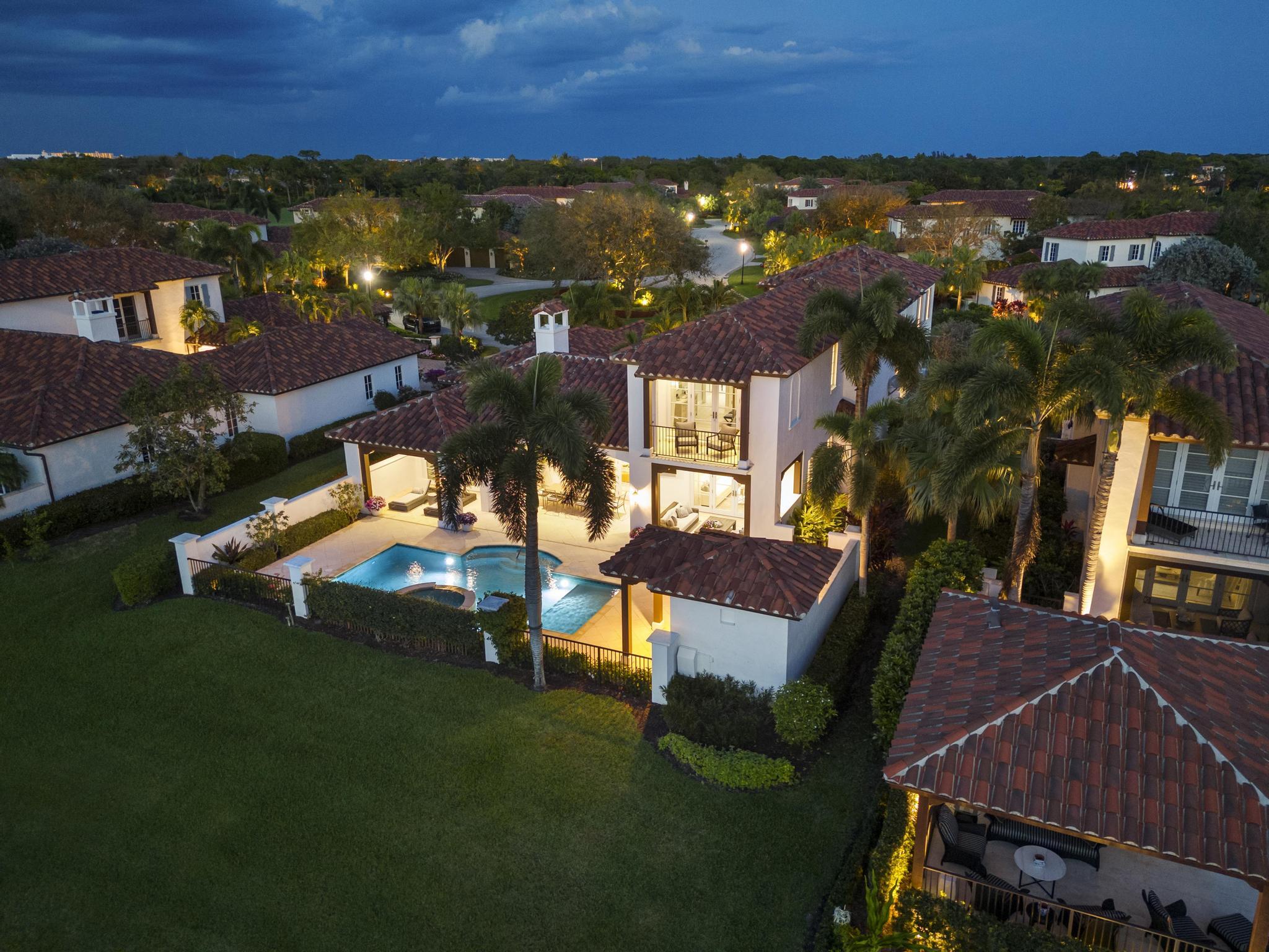 426 Red Hawk Drive Jupiter, FL 33477 - Photo 51 of 70 an aerial view of a house with a garden