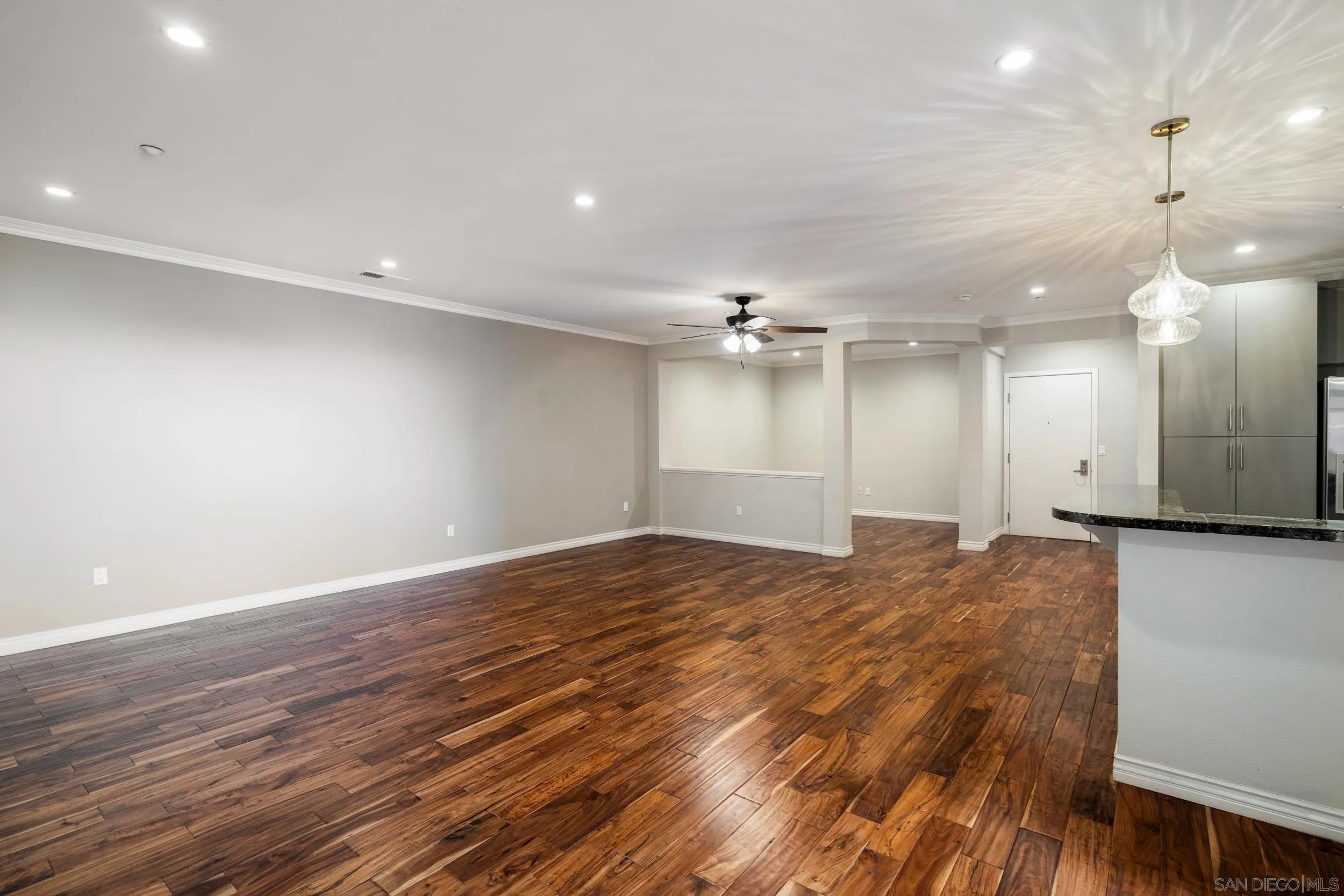 3650 Fifth Avenue, Unit 415 San Diego, CA 92103 - Photo 11 of 31 a view of large room with wooden floor
