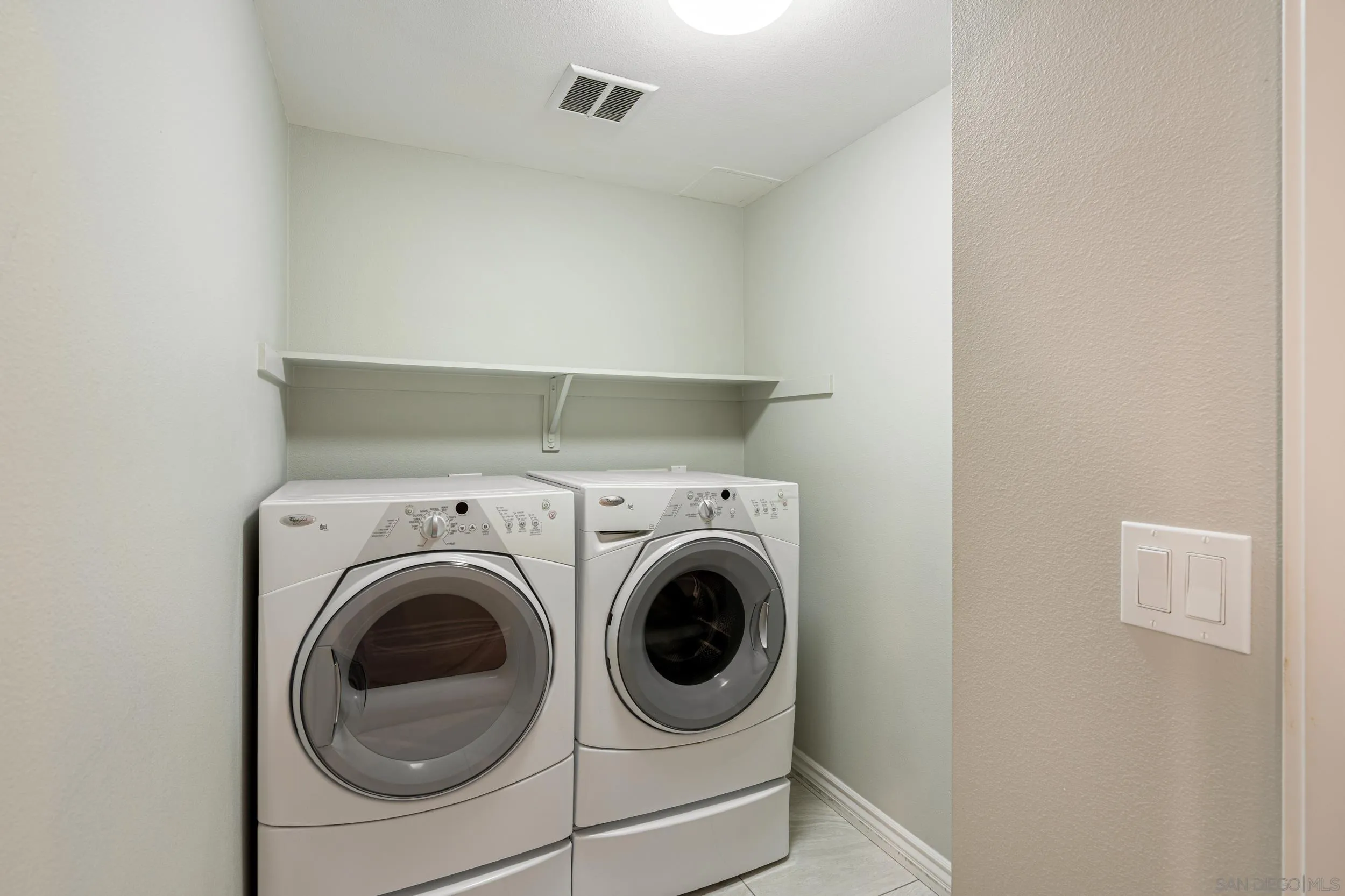 3650 Fifth Avenue, Unit 415 San Diego, CA 92103 - Photo 23 of 31 a utility room with dryer and washer