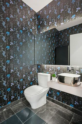 a bathroom with a sink toilet and bathtub