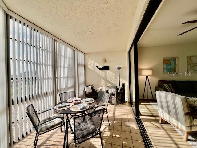 3020 Matecumbe Key Road, Unit 103 Punta Gorda, FL 33955 - Photo 29 of 55 a view of a dining room with furniture and wooden floor