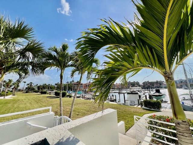 3020 Matecumbe Key Road, Unit 103 Punta Gorda, FL 33955 - Photo 36 of 55 a view of outdoor space with swimming pool and lounge chair