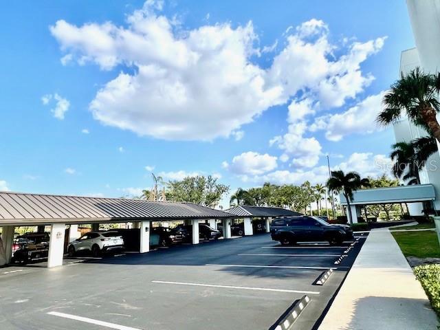 3020 Matecumbe Key Road, Unit 103 Punta Gorda, FL 33955 - Photo 4 of 55 a view of a house with a yard