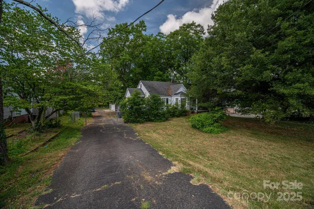 a view of a street with a trees