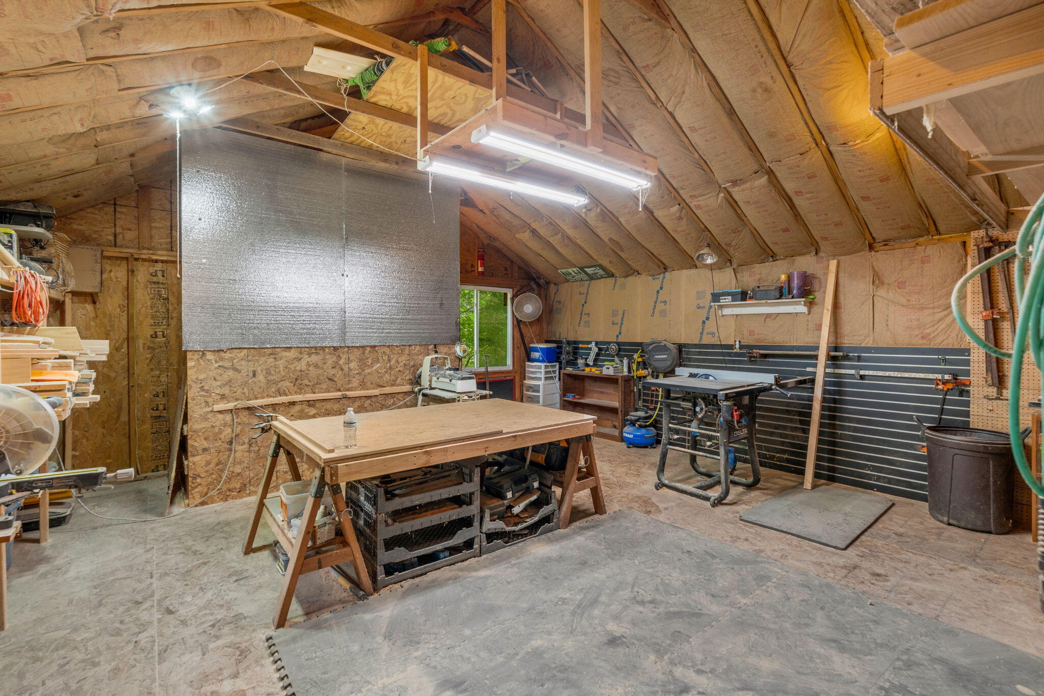 406 Brann Road Levant, ME 04456 - Photo 58 of 110 Woodshop Overhead of Detached Garage