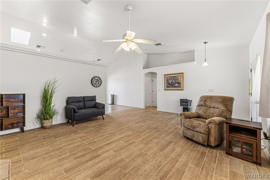 9332 Branded Road Kingman, AZ 86401 - Photo 8 of 44 a living room with furniture and a wooden floor