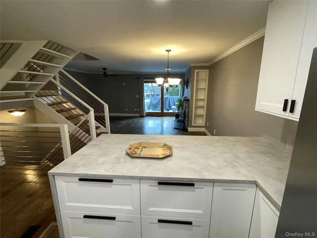 a view of kitchen and kitchen island