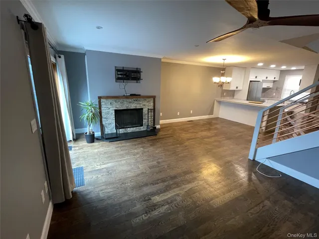 a view of a livingroom with a fireplace