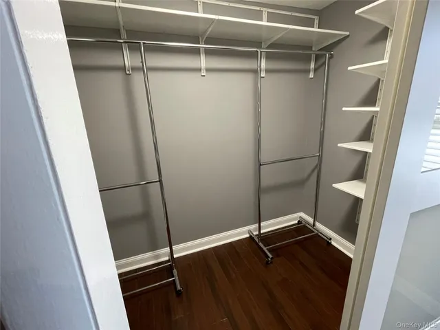 a view of an empty walk in closet