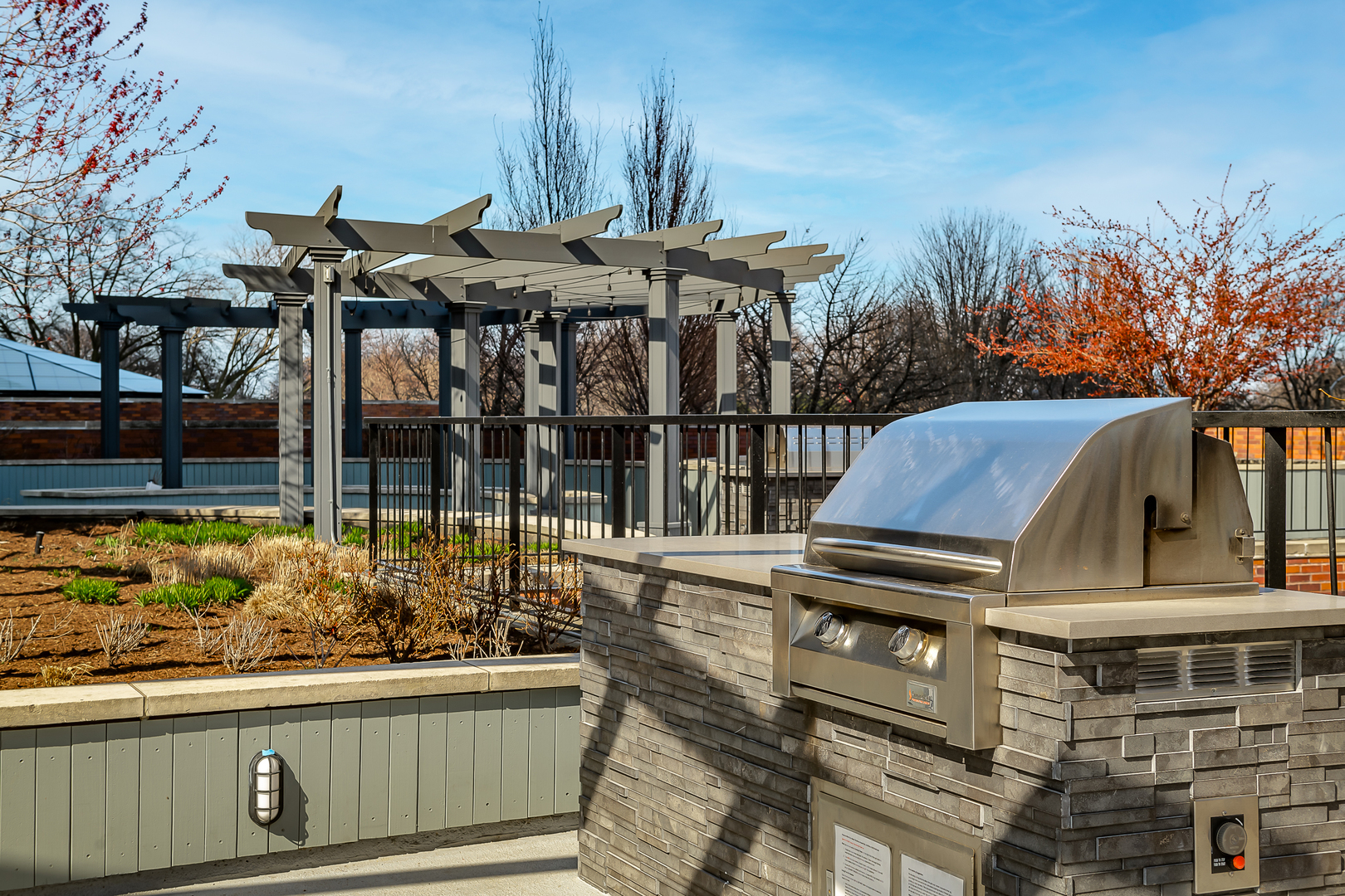 5415 North Sheridan Road, Unit 3004 Chicago, IL 60640 - Photo 17 of 26 a view of a brick house with many windows