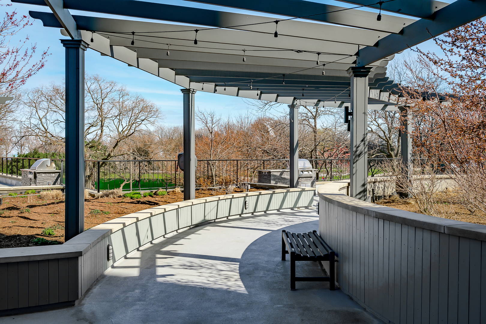 5415 North Sheridan Road, Unit 3004 Chicago, IL 60640 - Photo 18 of 26 a view of a porch with furniture and wooden deck