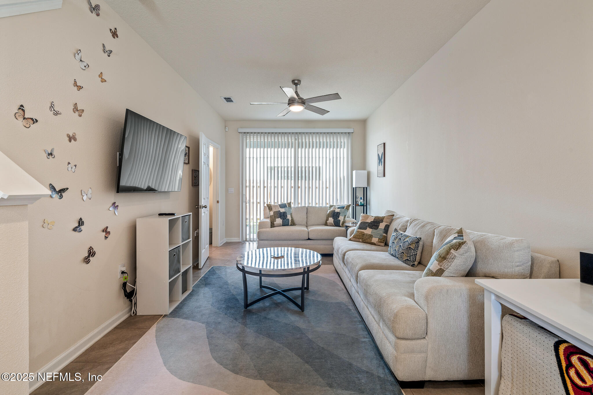 113 Red House Cir Street St. Augustine, FL 32084 - Photo 13 of 40 a living room with furniture and a flat screen tv
