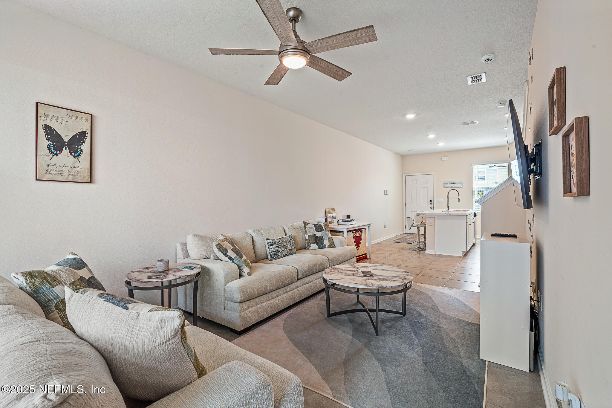 113 Red House Cir Street St. Augustine, FL 32084 - Photo 14 of 40 a living room with furniture and a view of kitchen