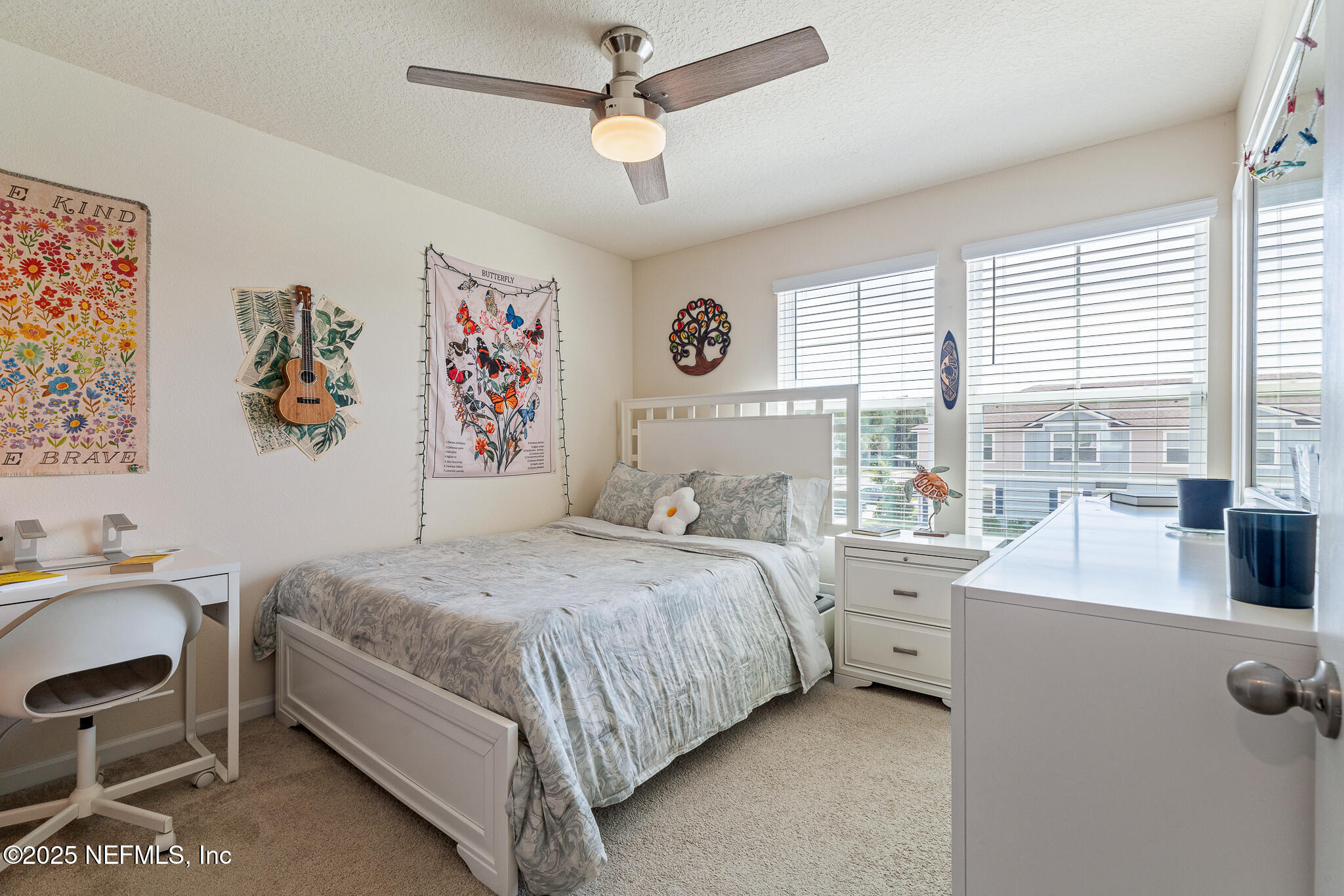 113 Red House Cir Street St. Augustine, FL 32084 - Photo 17 of 40 a bedroom with a bed couch and a window