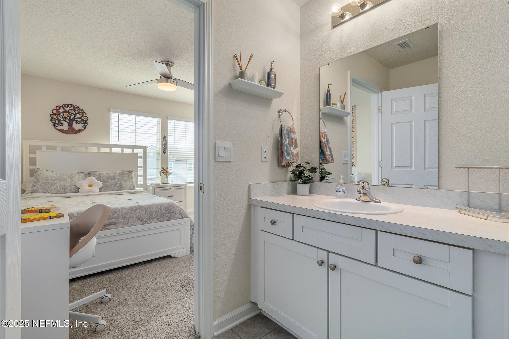 113 Red House Cir Street St. Augustine, FL 32084 - Photo 20 of 40 a en suite bathroom with a sink double vanity and a mirror