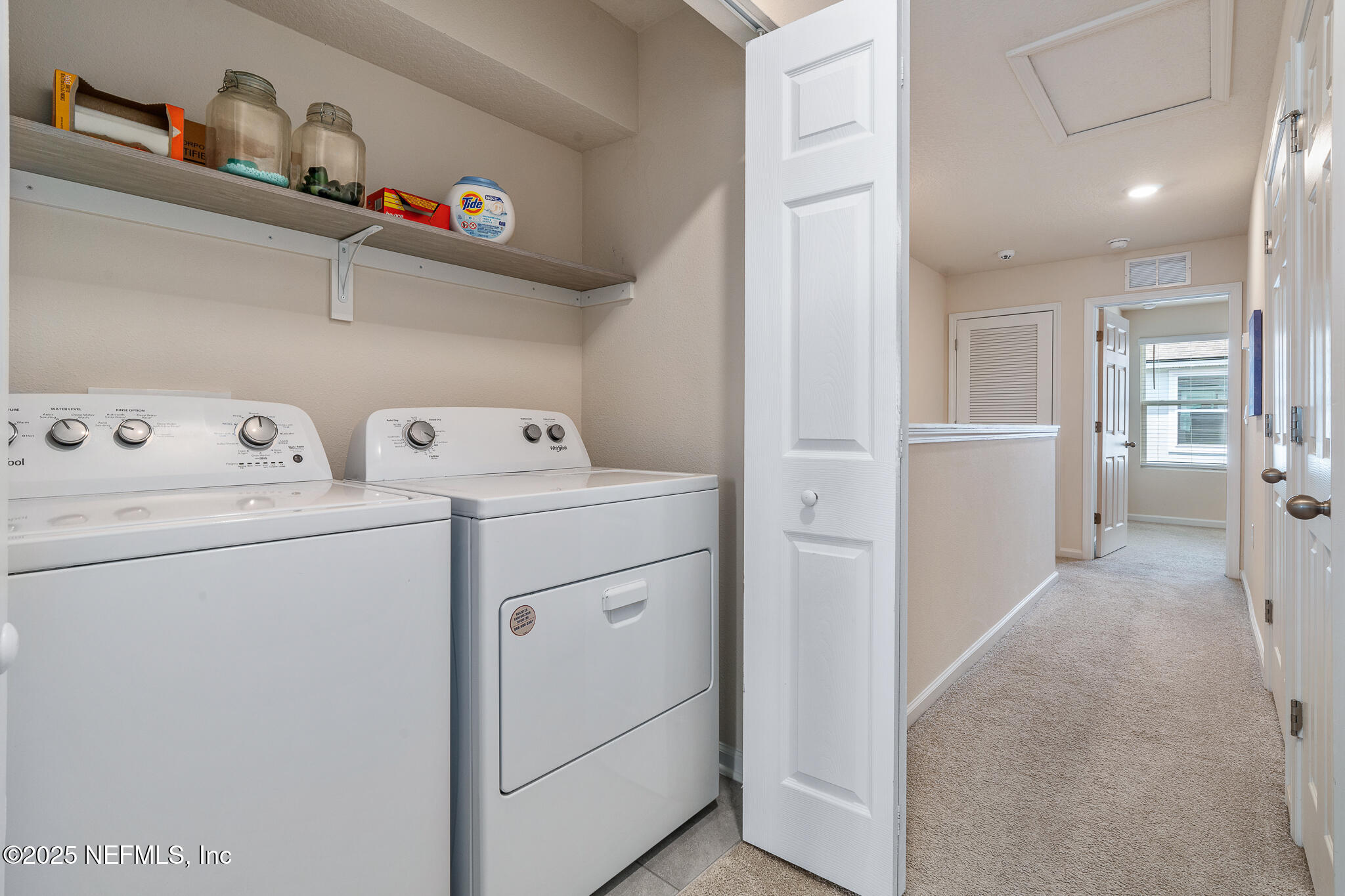 113 Red House Cir Street St. Augustine, FL 32084 - Photo 21 of 40 a view of storage and utility room with washer and dryer