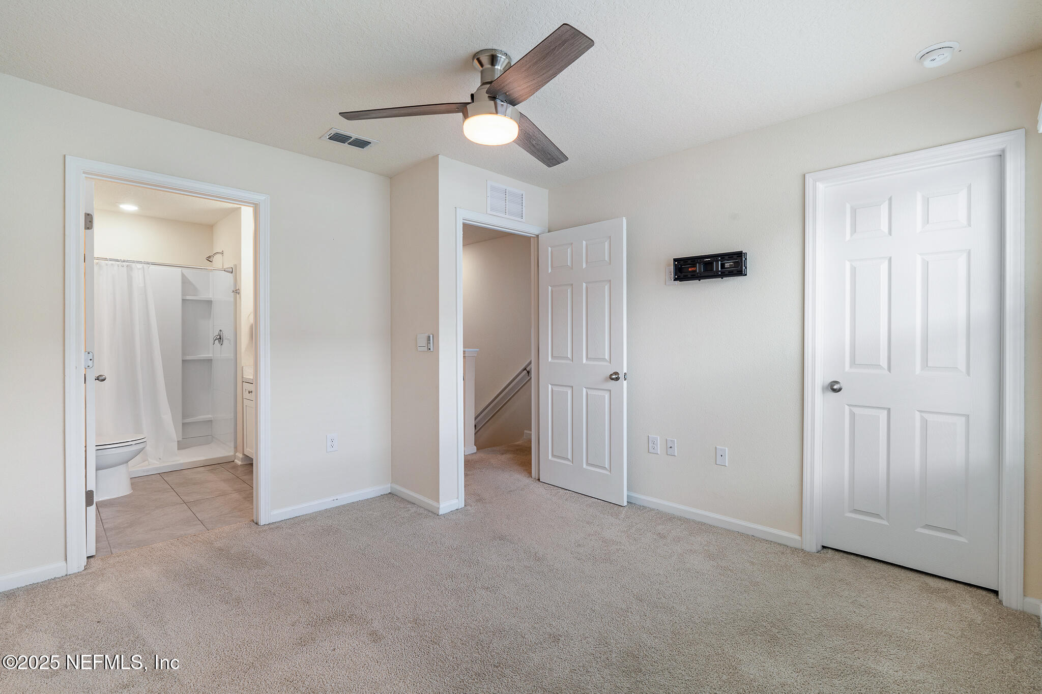 113 Red House Cir Street St. Augustine, FL 32084 - Photo 24 of 40 a view of empty room with a ceiling fan