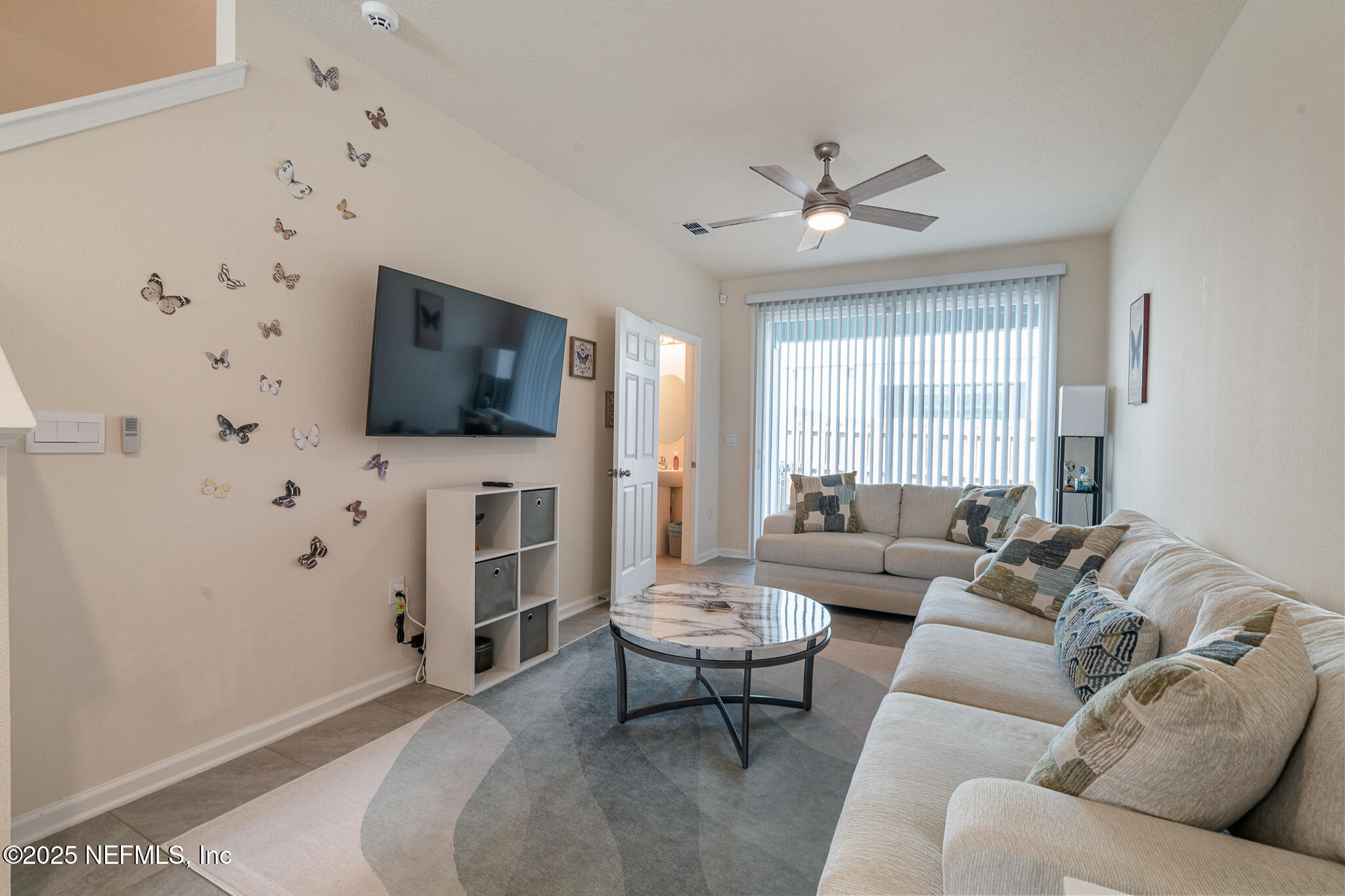 113 Red House Cir Street St. Augustine, FL 32084 - Photo 3 of 40 a living room with furniture and a flat screen tv