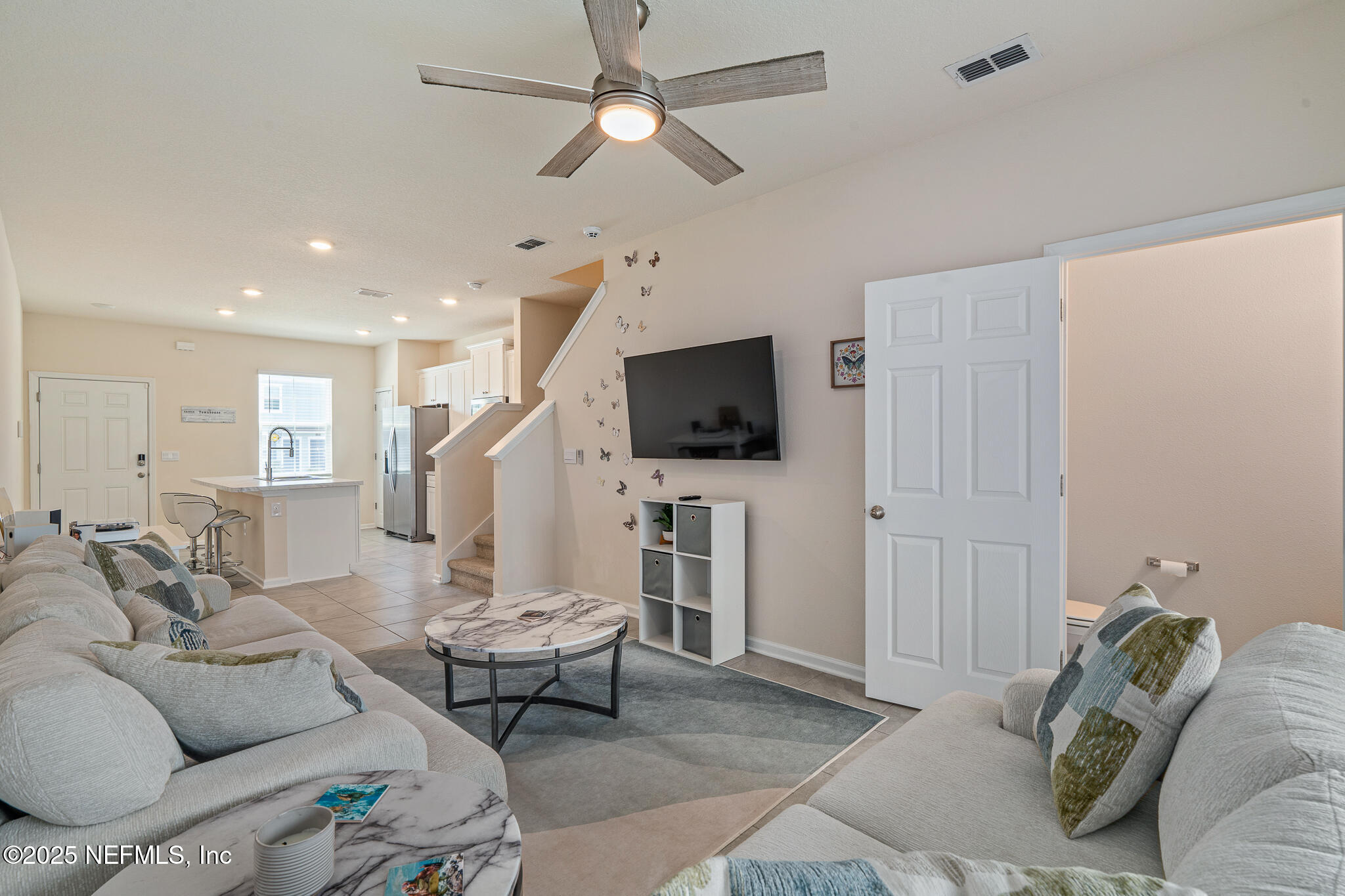 113 Red House Cir Street St. Augustine, FL 32084 - Photo 4 of 40 a living room with furniture and a flat screen tv