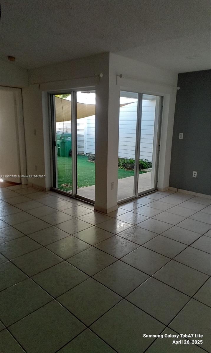 13764 Southwest 149th Cir Lane, Unit 1 Miami, FL 33186 - Photo 6 of 16 a view of empty room