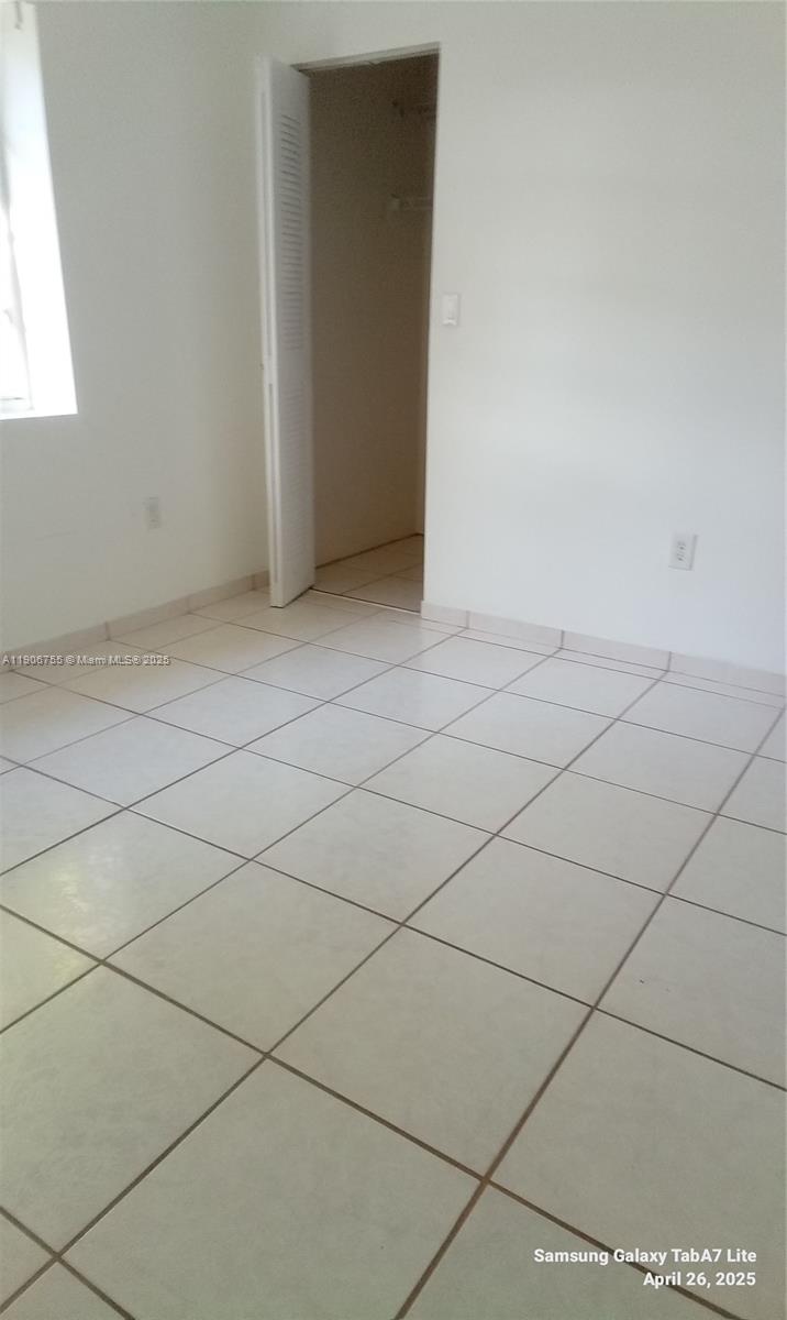 13764 Southwest 149th Cir Lane, Unit 1 Miami, FL 33186 - Photo 8 of 16 a view of cupboard