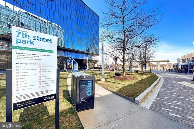a view of a cafe with sitting area